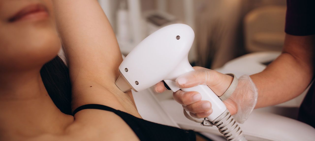 young-woman-receiving-underarm-laser-hair-removal